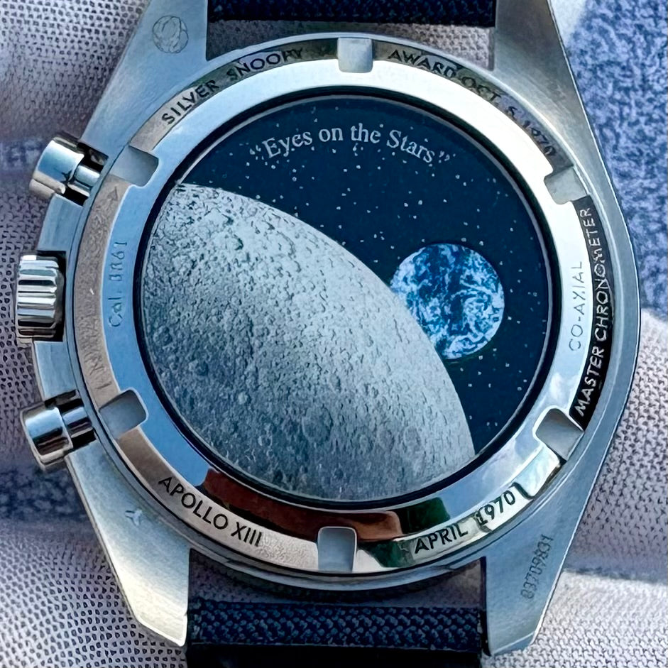 SOLD / ON REQUEST Omega Speedmaster Silver Snoopy Award 310.32.42.50.02.001